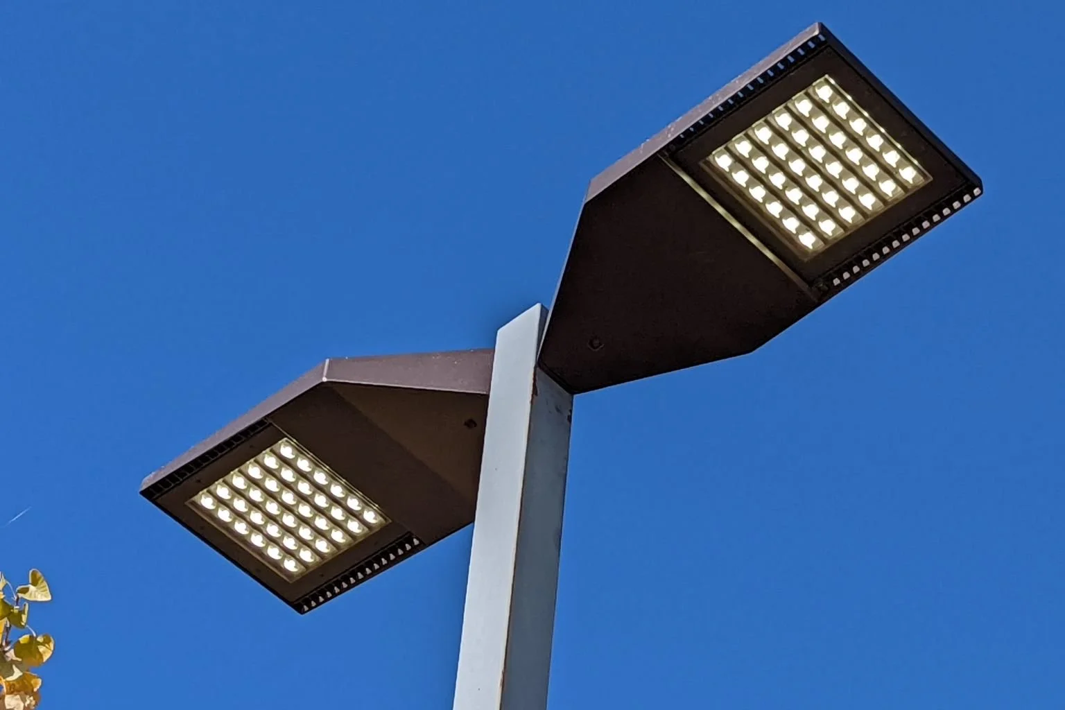 LED parking lot light fixtures installed on a commercial light pole by MTE Electric, providing energy-efficient outdoor lighting for businesses in Apple Valley and the Victor Valley area.