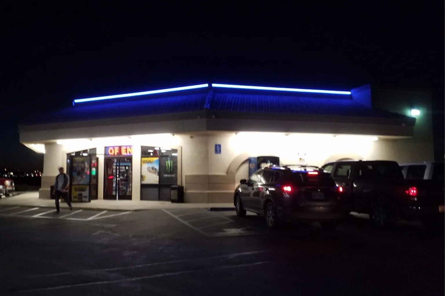 MTE Electric commercial lighting installation in Apple Valley, CA, featuring blue LED accent tape lighting, building wall packs, and bright parking lot lights.