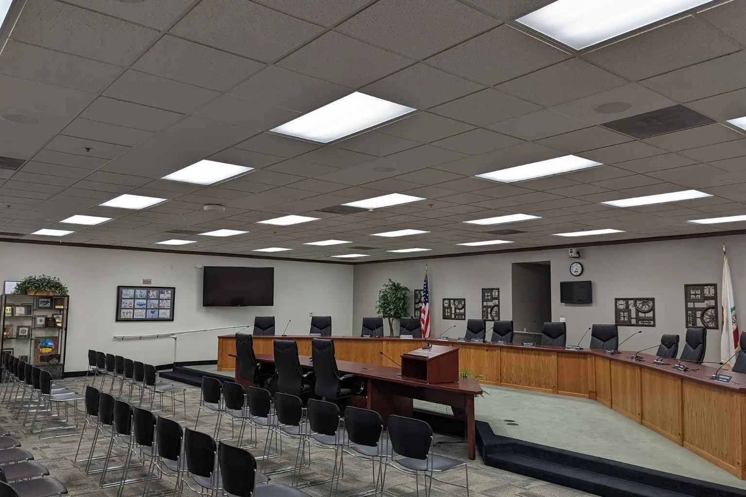 Commercial interior LED lighting installation in a large meeting room with recessed ceiling light panels in the California High Desert.