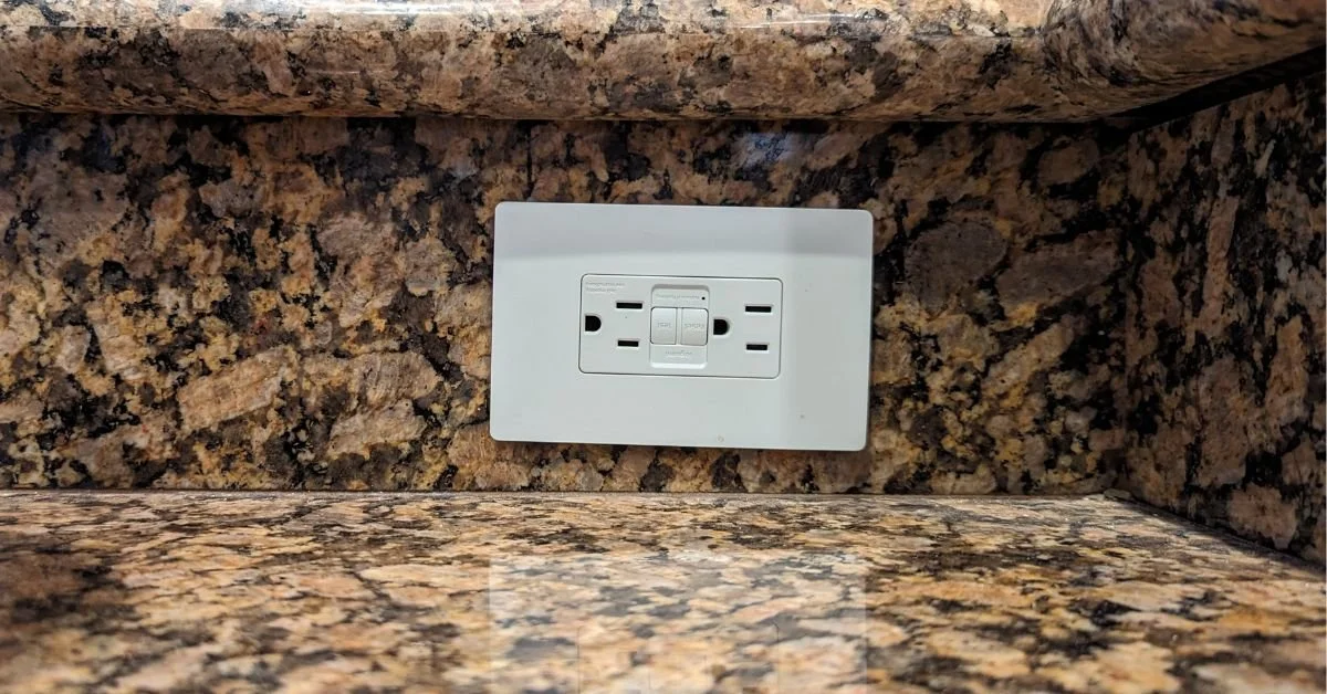 Replaced a faulty GFCI receptacle on the backsplash of this counter in a local Phelan, California home.