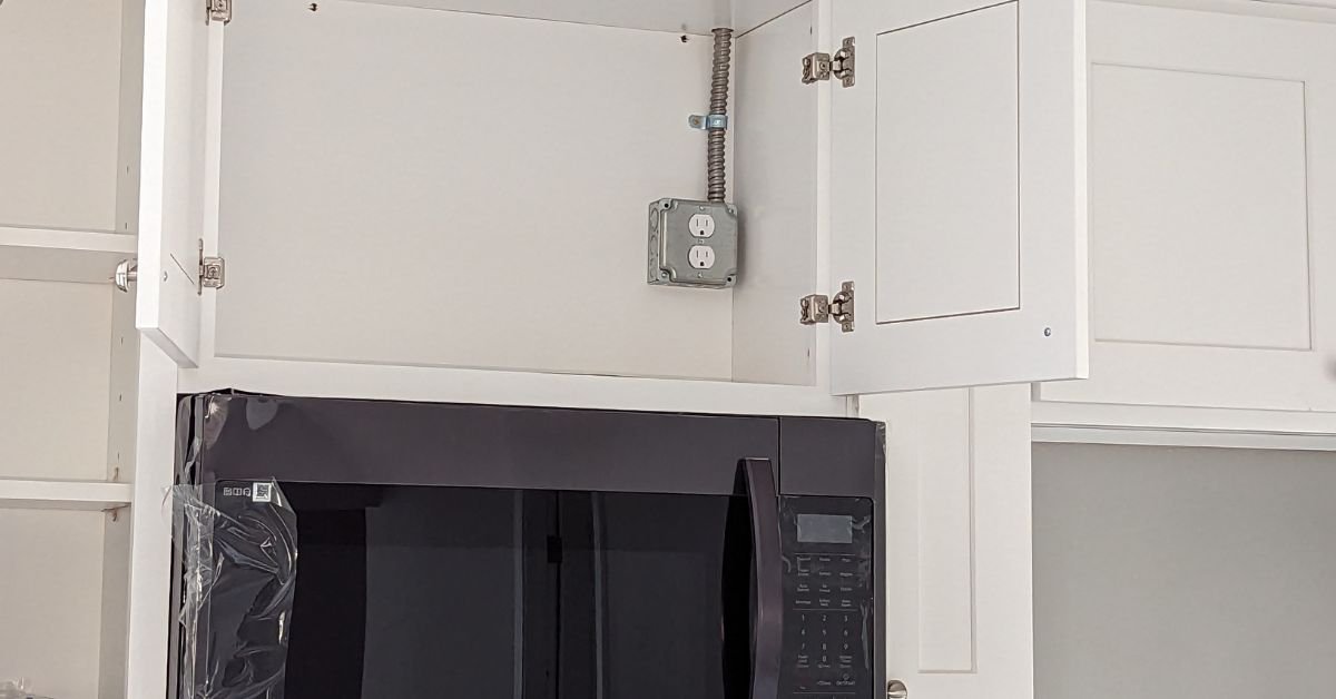Wiring for a new electrical outlet to supply power to an over-the-range microwave in Victorville, California.