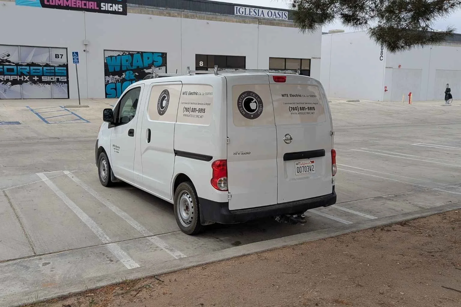 MTE Electric commercial electrician service van parked at a business complex in Hesperia California providing electrical services for local commercial properties.