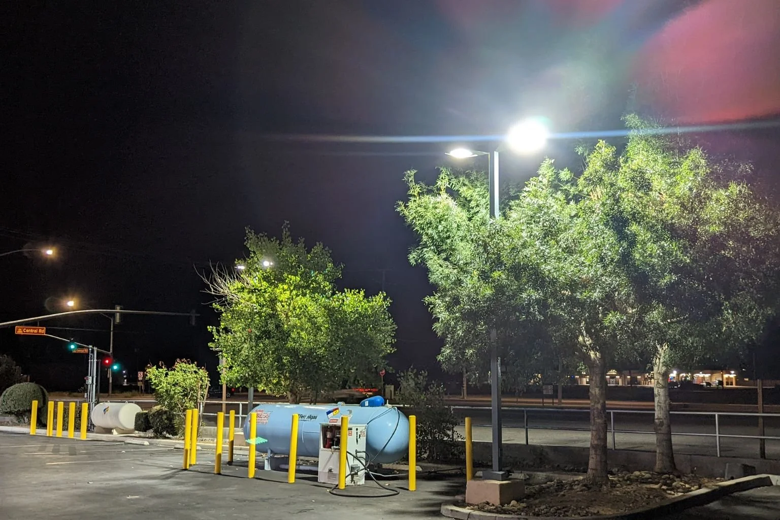 LED parking lot lighting upgrade completed by MTE Electric at a local Apple Valley service station featuring new LSI LED area light fixtures replacing outdated metal halide lighting.