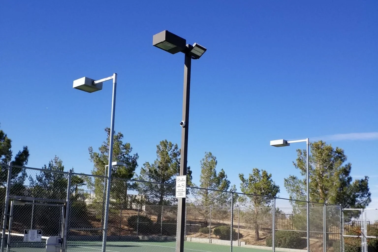 MTE Electric's electrician added an LED flood light fixture to this existing light pole in Victorville, California.