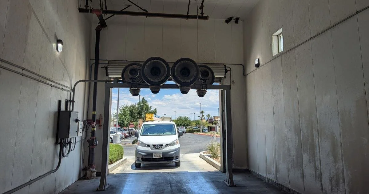 LED wall pack lighting installed inside a commercial car wash in Hesperia, California.