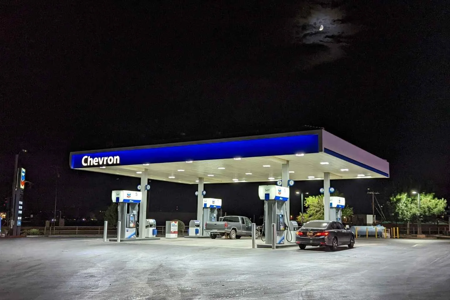 LED canopy lighting installed at a Chevron service station in Apple Valley, California, replacing metal halide fixtures to improve nighttime visibility and energy efficiency.