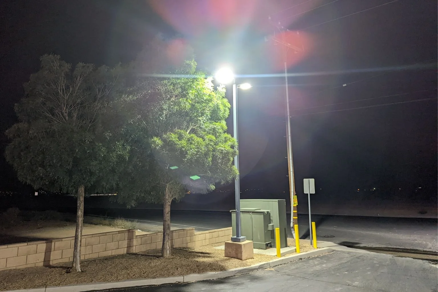 Commercial LED parking lot lighting installed by MTE Electric at a service station in Apple Valley, California.