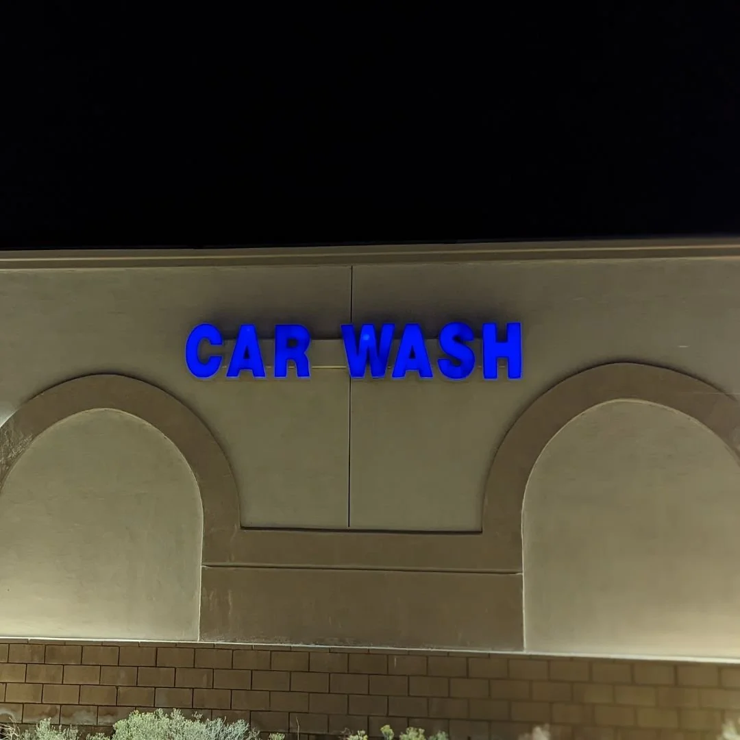 Sign lighting repair in Apple Valley, California—our electrician replaced the faulty high-output ballast in this car wash sign to restore bright, reliable illumination.