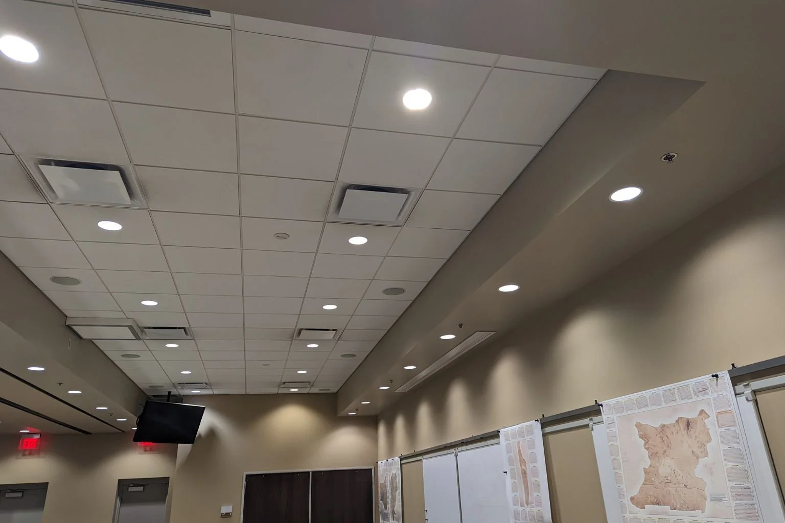 Back view of Mojave Water Agency boardroom in Apple Valley CA showing upgraded LED lighting after commercial lighting repair by a local electrician in the Town of Apple Valley.