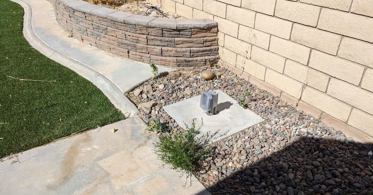 Our electrician removed an old light pole and repurposed the existing wiring to supply power to a new GFCI outlet in the Silver Lakes community of Helendale, California.