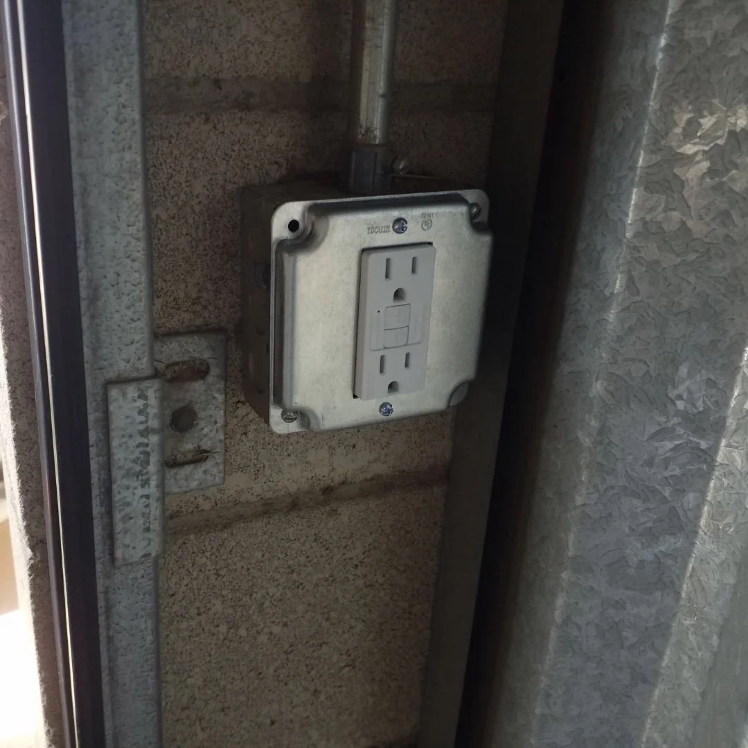 Our electrician extended an existing 110-volt branch circuit to install a new GFCI outlet for powering security cameras at this local Apple Valley self-storage facility in Apple Valley, California.