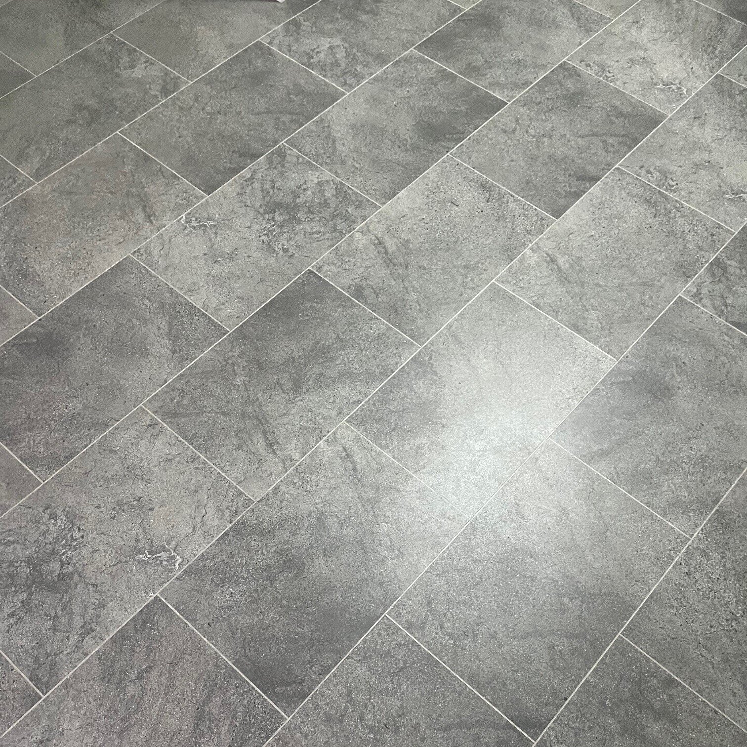 @karndean_uk Knight Tile - Cumbrian Stone ST14

One of the darkest tiles in their Knight Tile collection, Cumbrian Stone, combines smoky charcoal and carbon tones in a contemporary wider scale 18x12&quot; tile format. Because of its darker colouring 