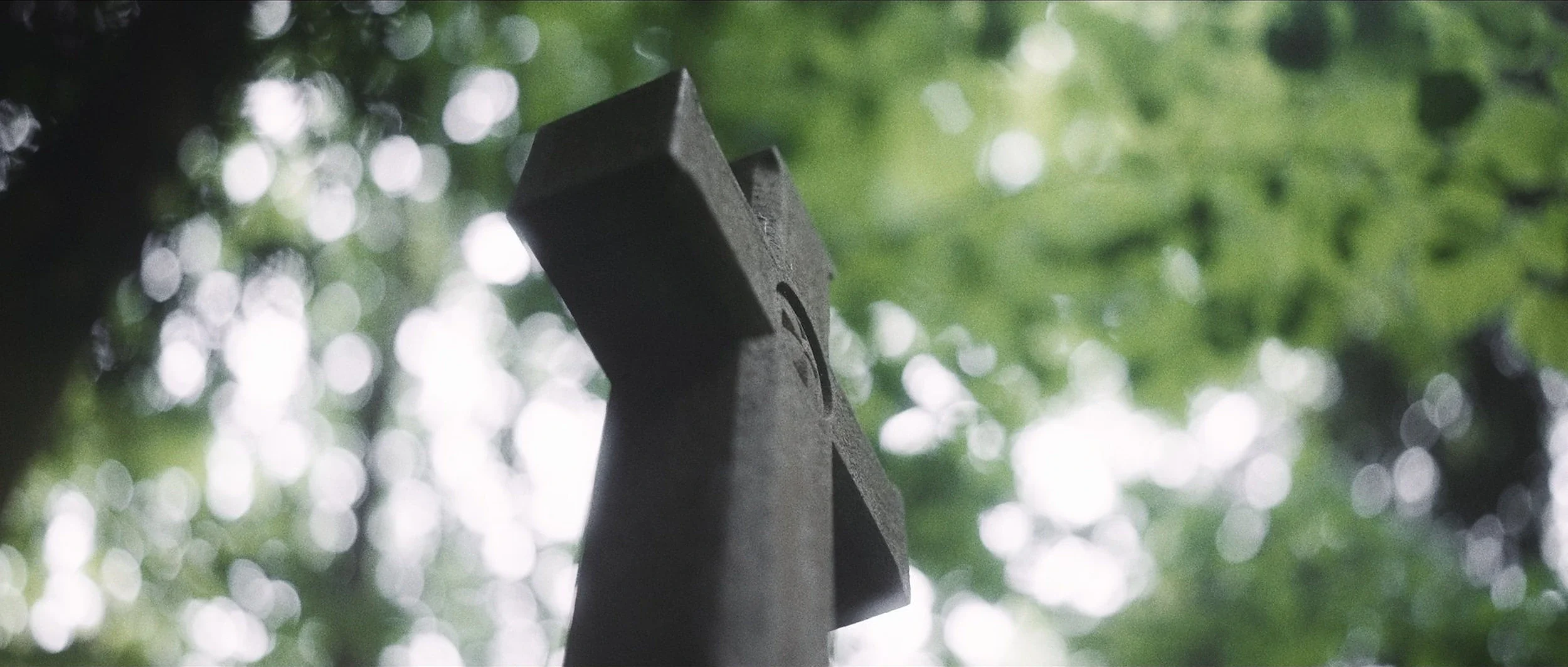 gunslinger-western-short-film-iron-grave-cross.webp