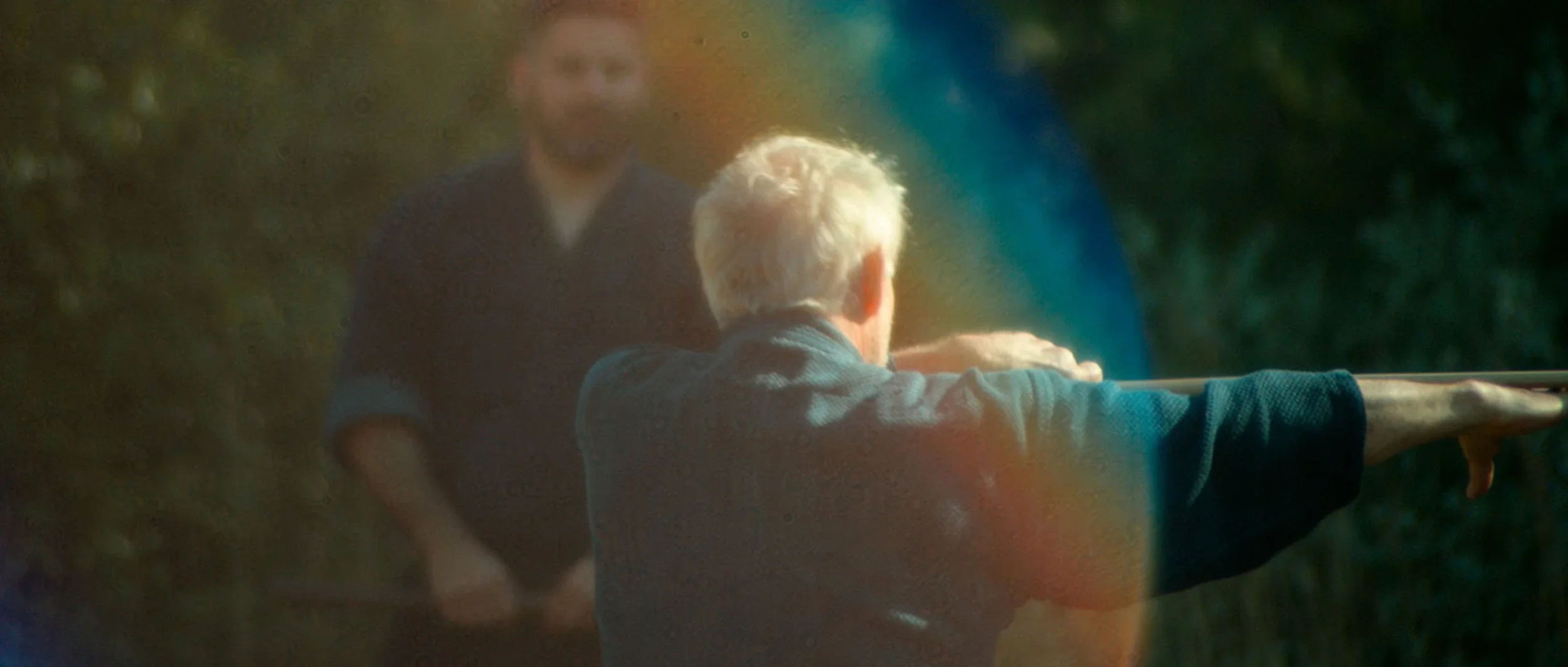 martial-arts-documentary-instructor-bokken-lens-flare.webp