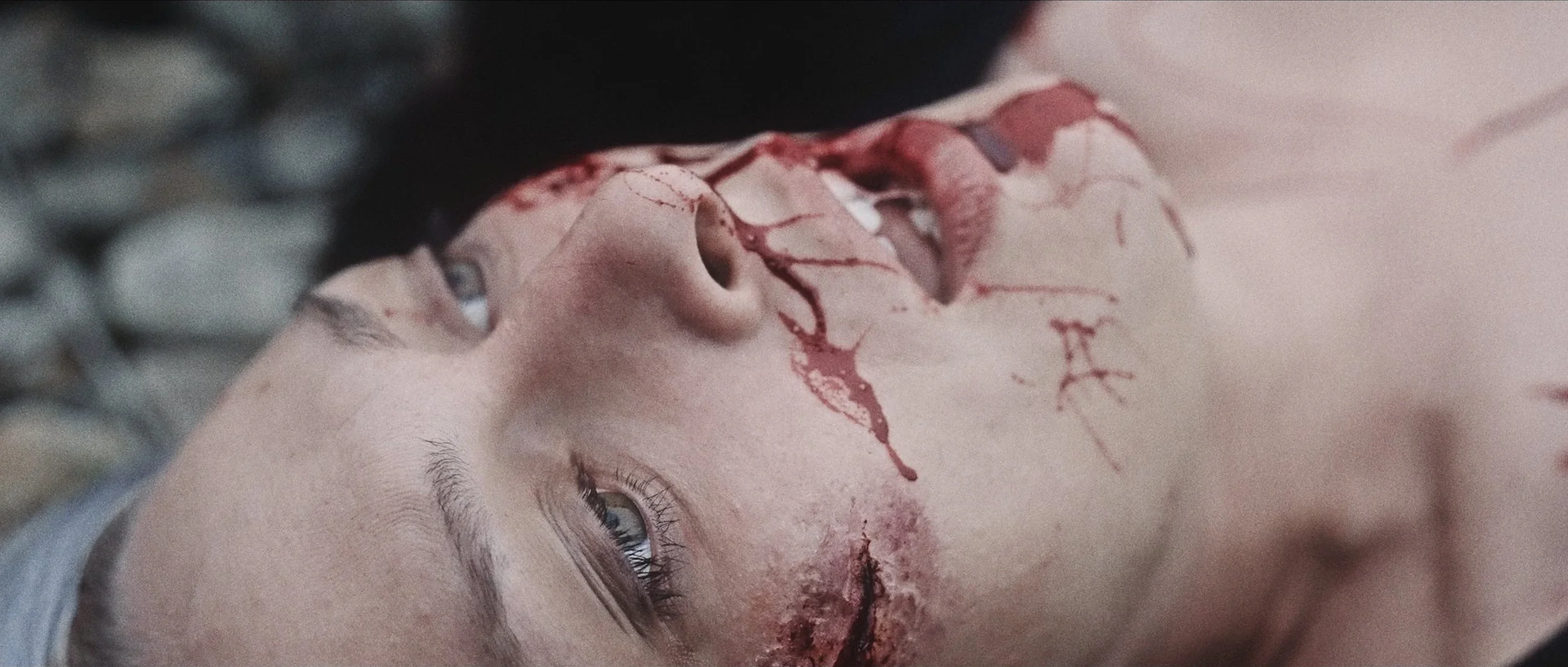 gunslinger-western-short-film-wounded-face-closeup.webp