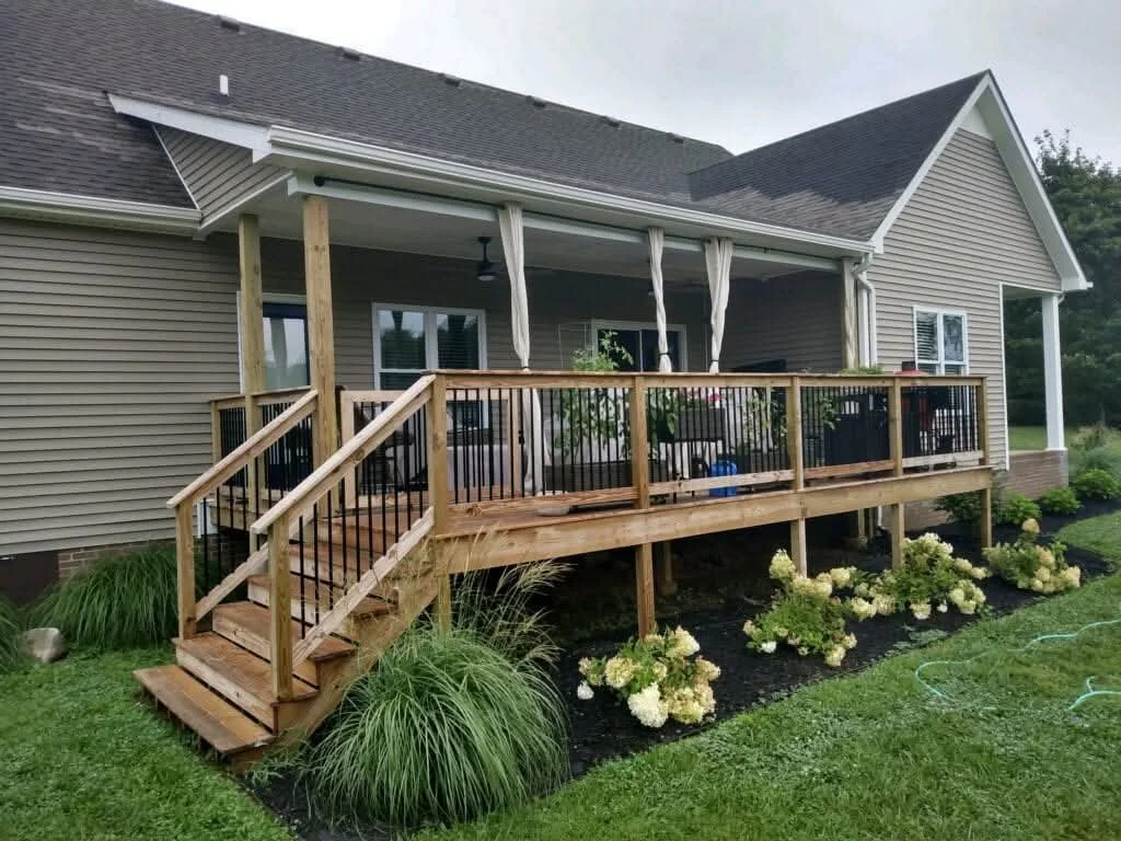 Quality treated covered deck with aluminum spindles