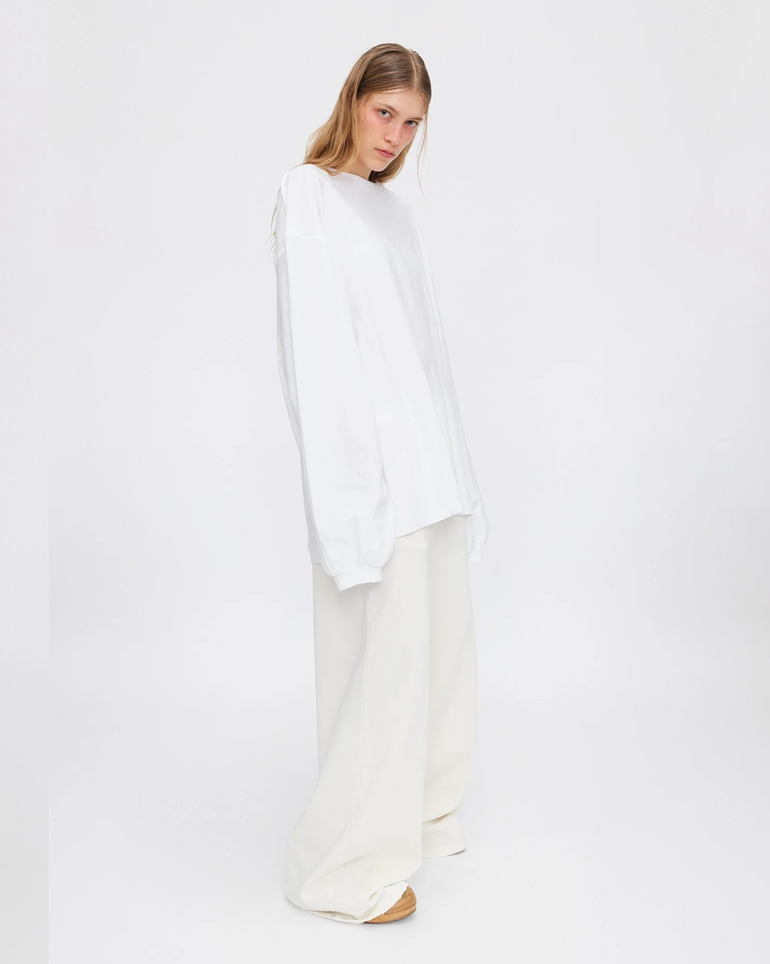 Inside_Out_White_Long_Sleeve_Body_Side.jpg