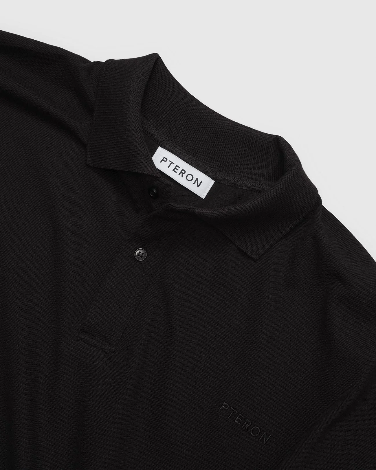 Loose_Fitted_Polo_D_Black_Pteron.jpg