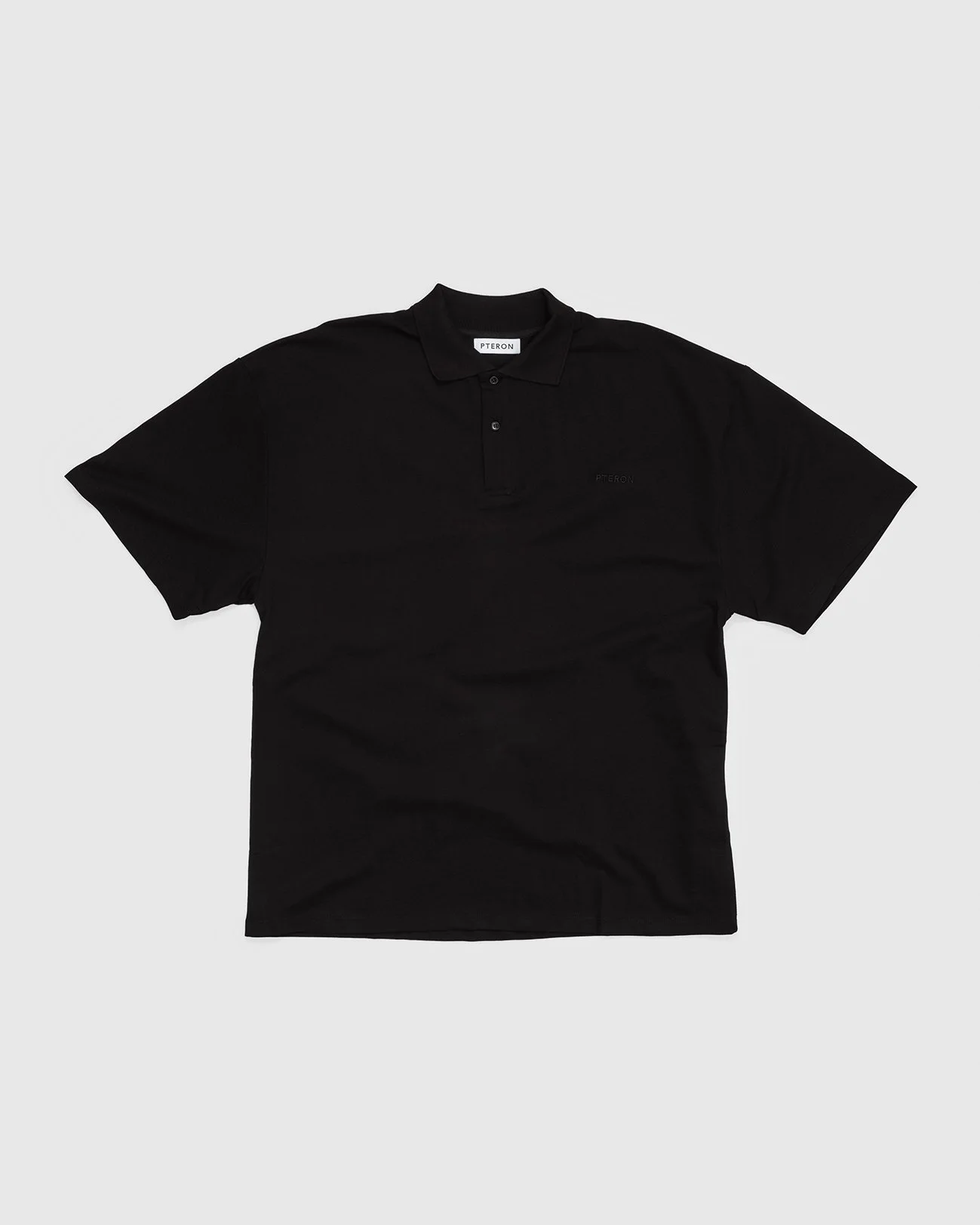 Pteron_Loosfitted_Polo_Black_F.jpg