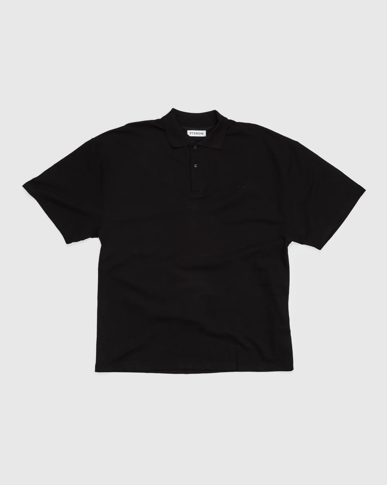 Loose_Fitted_Polo_Front_Black_Pteron.jpg