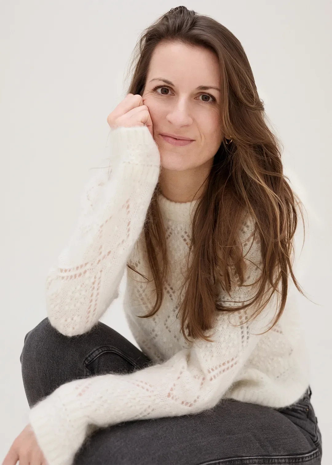 Coachin für Designer und kreative Führungskräfte lächelt freundlich