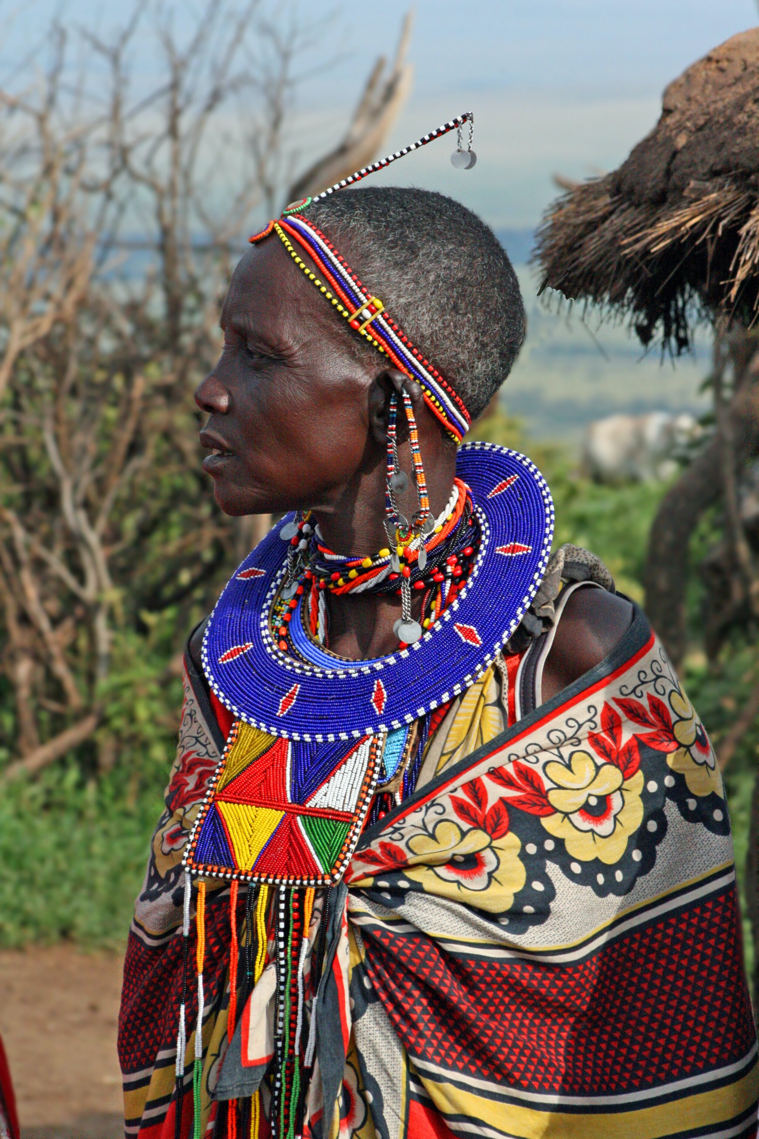 Three Maasai men wearing the distinctive shuka cloth in Kenya