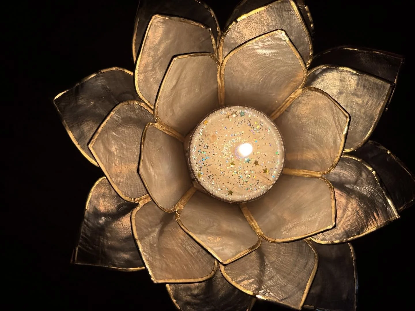 A beautiful photo of Soul Love UNITY Intention tealight candle in a lotus flower holder shared by a client 🙏💫. Thank you @cammiestutts Tealight holder came from @sanctuary_imports ❤️ Unity Mantra: &ldquo;I am one with all of Divine Creation.&rdquo;