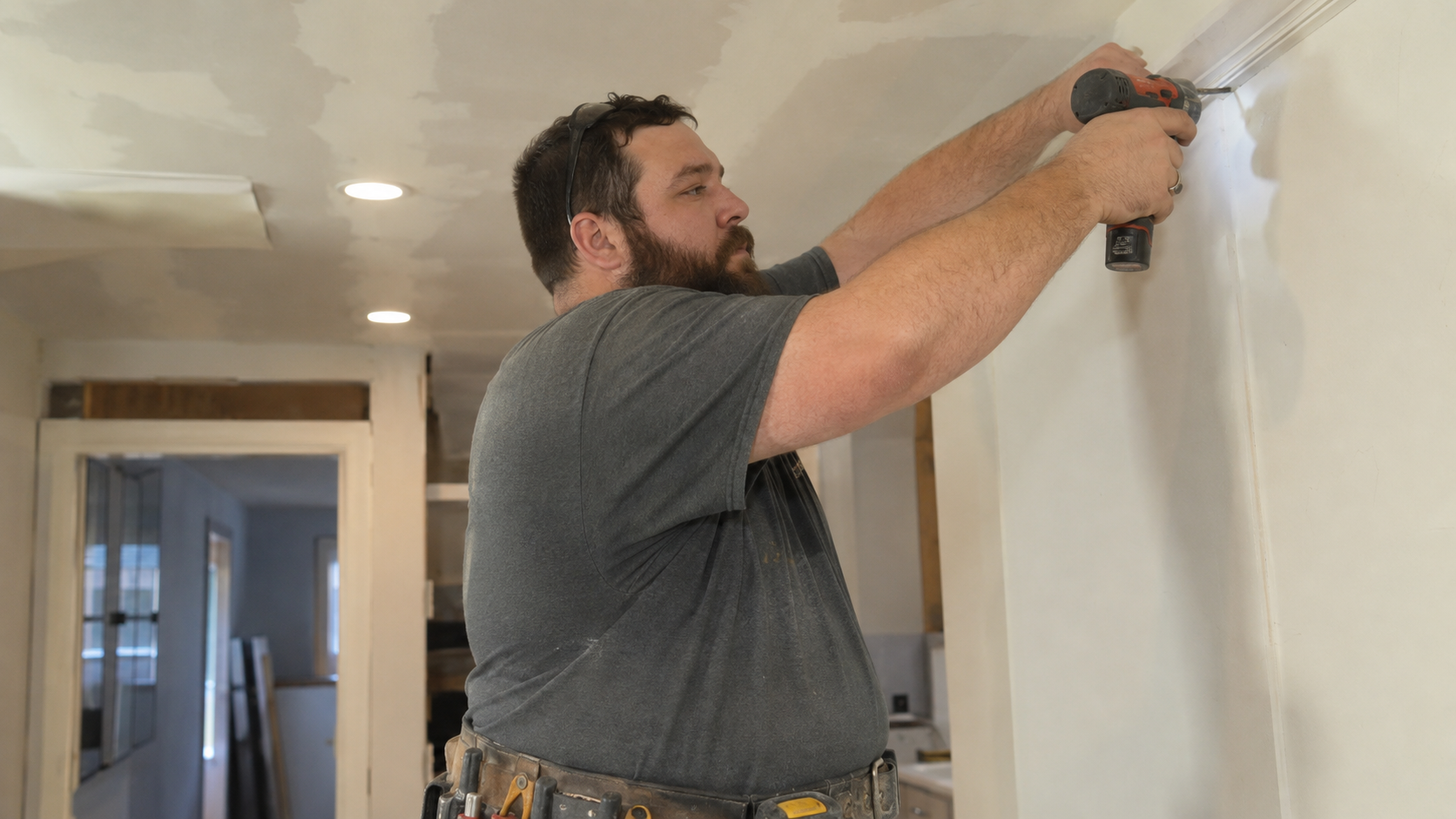 Self-employed remodeling contractor working on a home project, representing Sawyer Health Solutions helping Florida contractors and small business owners compare health insurance, life insurance, and supplemental coverage options.