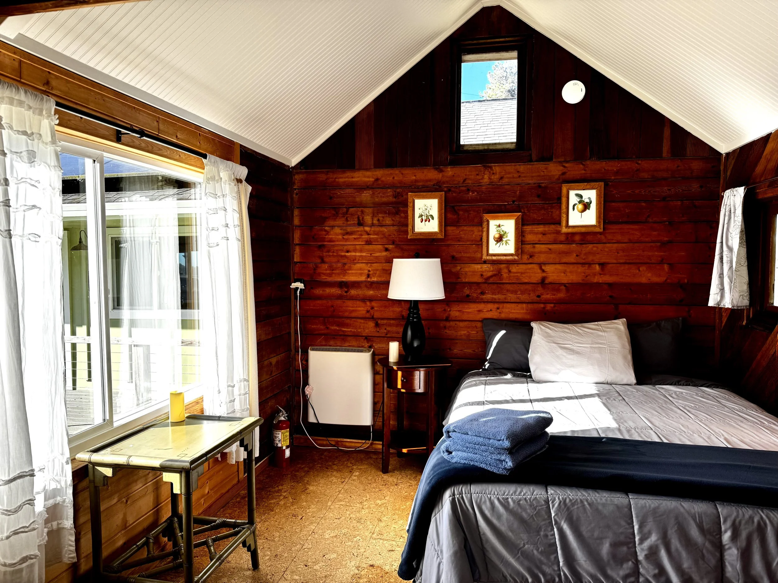 The Eucalyptus Cabin features a Queen sized bed.  Located nearest to the Office, Eucalyptus is the closest cabin to the shared Kitchen and Bathroom.  