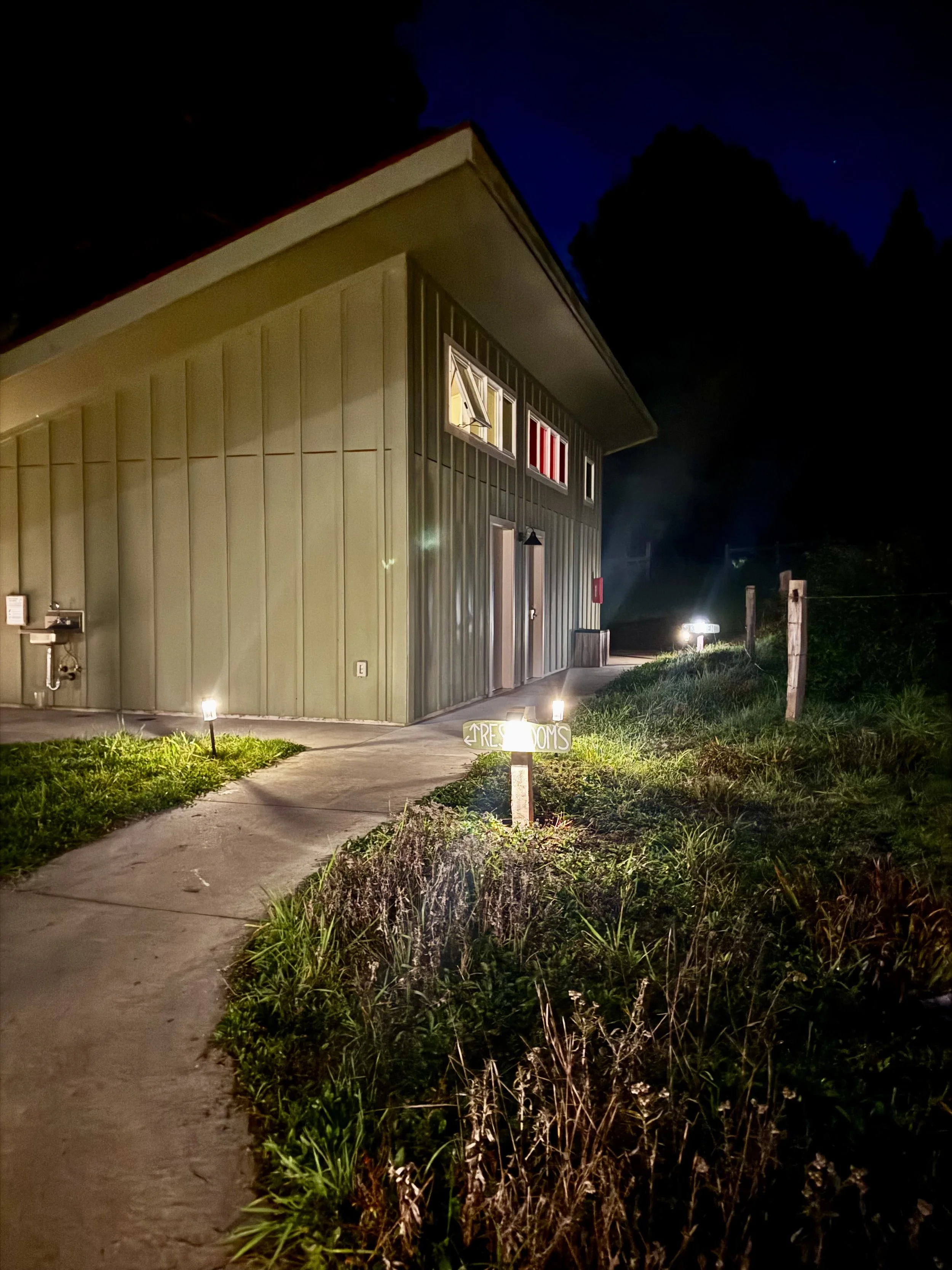 Restrooms are located in a separate building, just a short walk from the Bunkhouse.  
