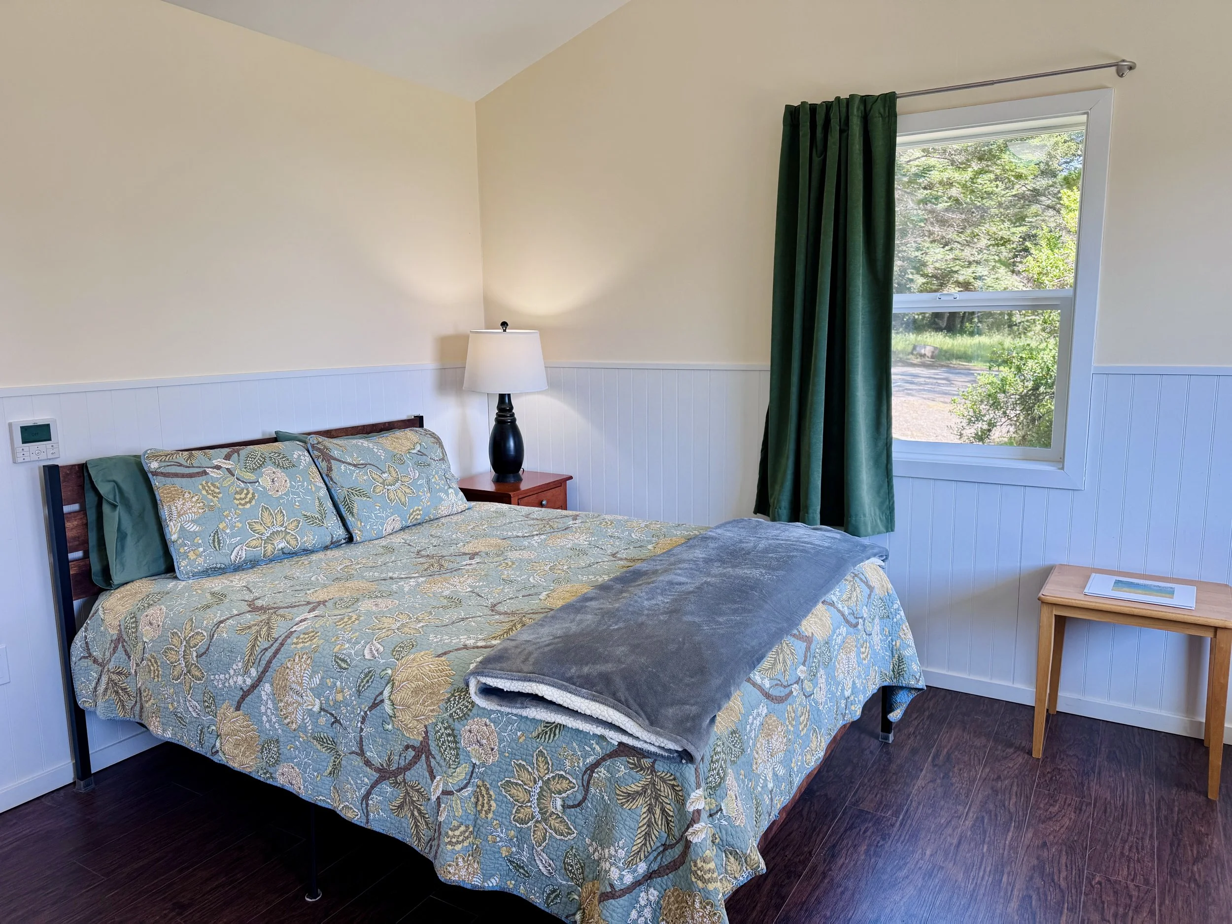 The Osprey Cottage features one queen bed
