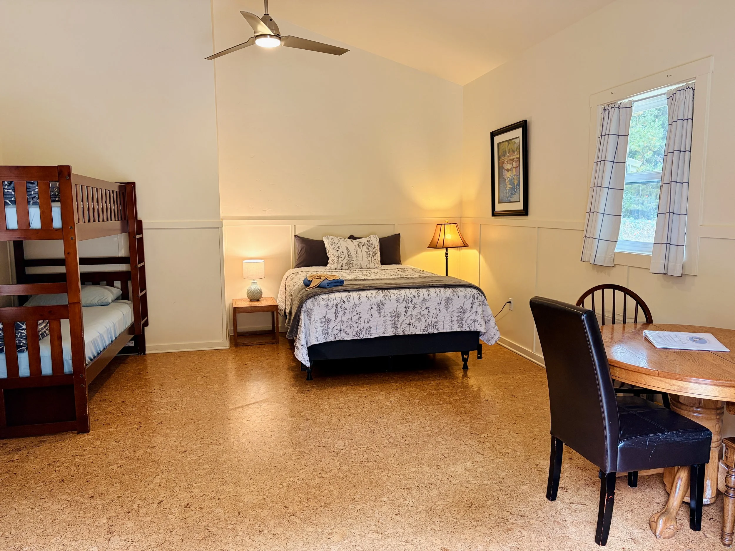 The Pygmy Forest Room - The Pygmy Forest and the Redwood Rooms each have a Queen size bed, one set of bunk beds, a small table with chairs, and a couch or futon - can accommodate up to 4 guests