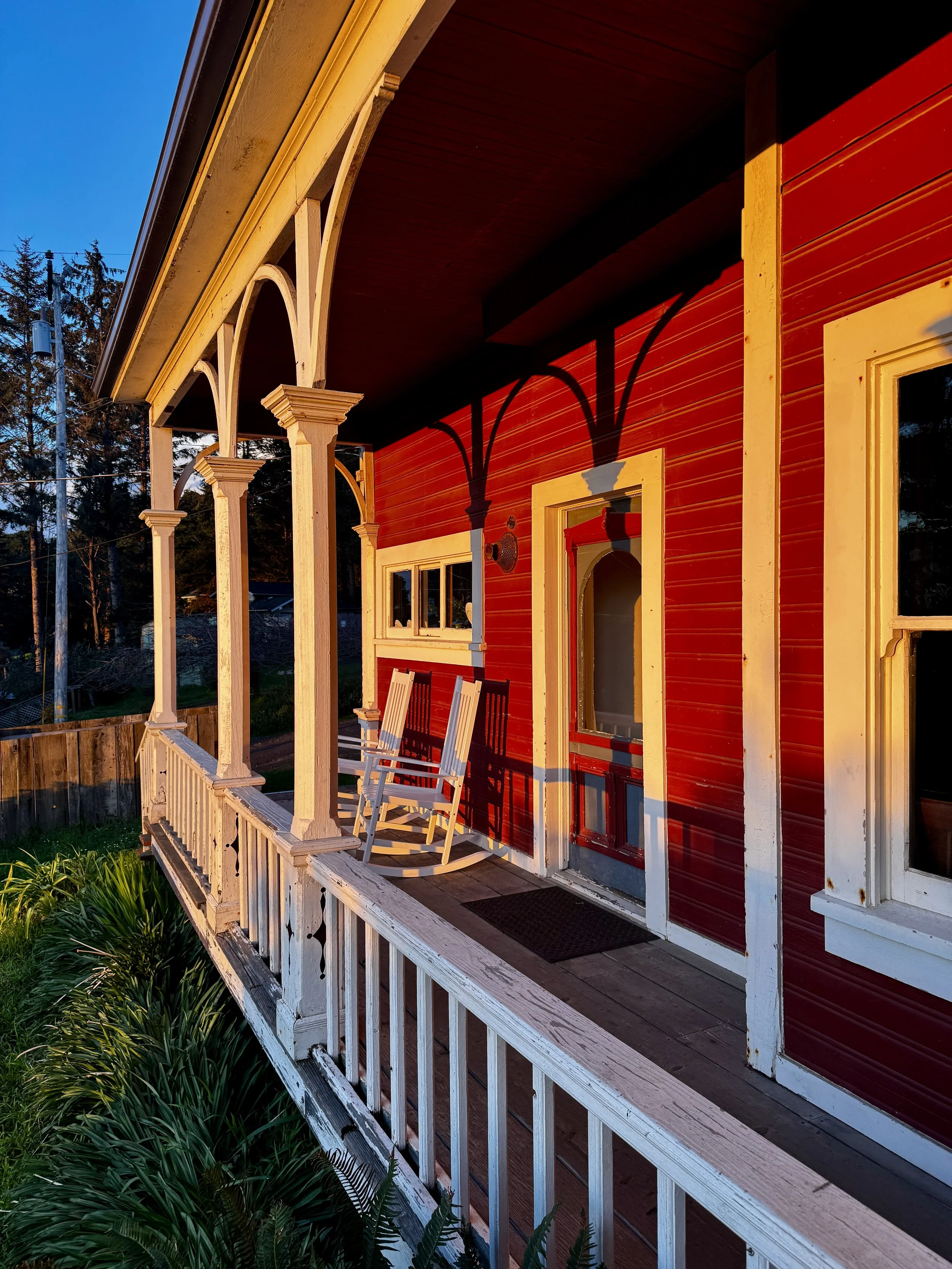 Grab a friend and your favorite beverage and take in the fresh coastal air from the rocking chairs on the Farmhouse's front porch.