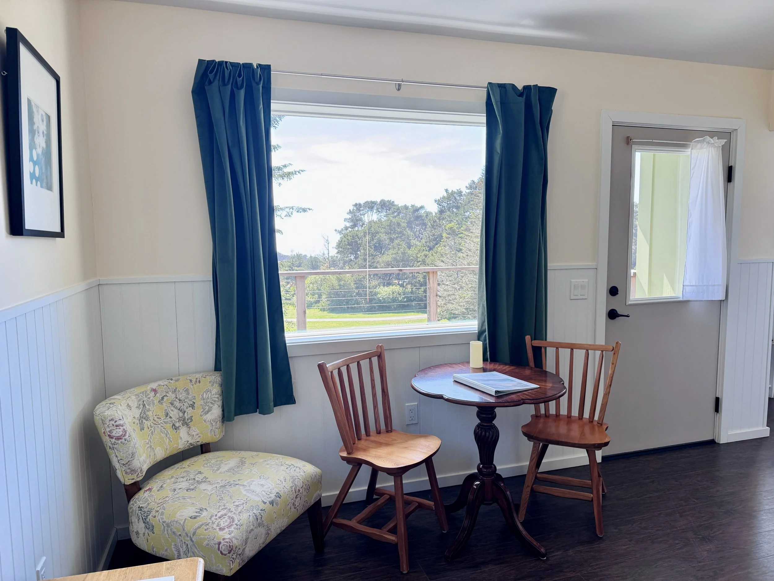 Osprey Interior - One queen bed, small sitting area; large picture window overlooking our expansive lawn and the Pacific Ocean