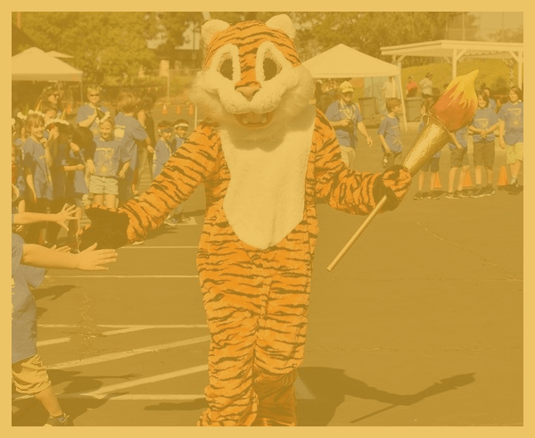tiger-mascot-high-fiving-students-at-��������-jogothon-event.png