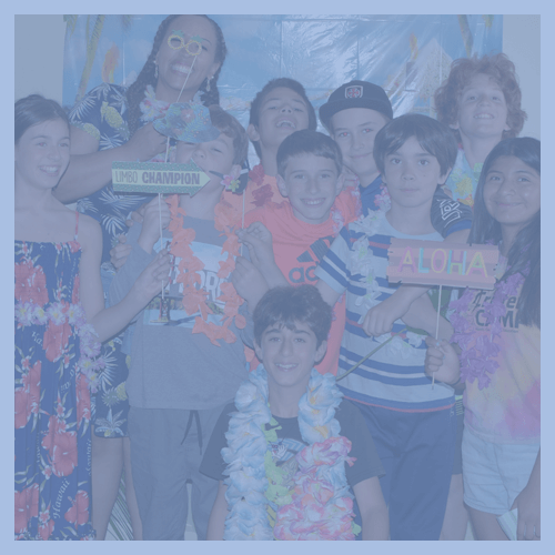 ��������-students-with-teacher-dressed-in-luau-attire-for-school-party.png