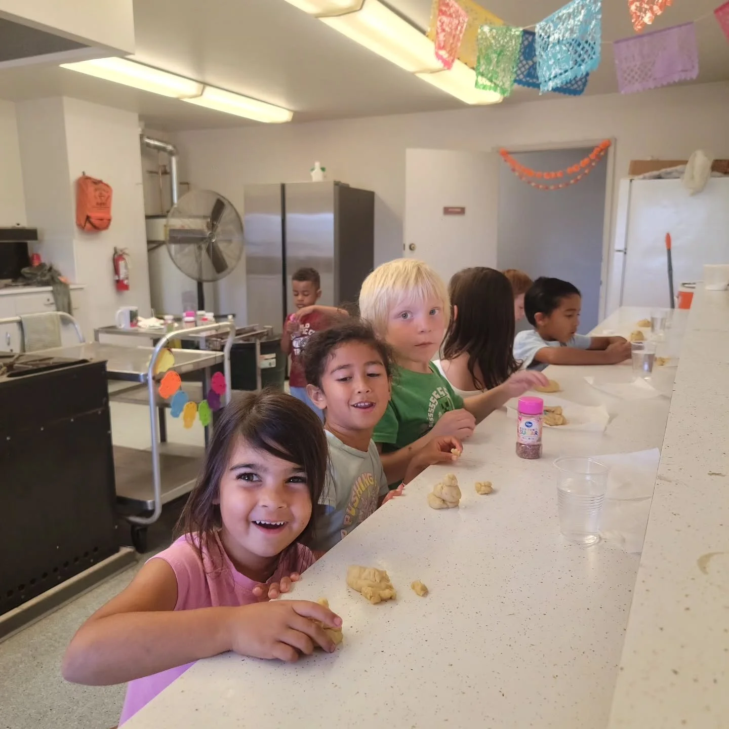 Nothing like learning through culture 🏵. Our students learned about D&iacute;a de Muertos by shaping and baking their own pan de muerto, and it was delicioso! A loved tradition here at TCPS🤎.

#thechildsprimaryschool #TheTCPSWay #TCPSSanDiego #TCPS