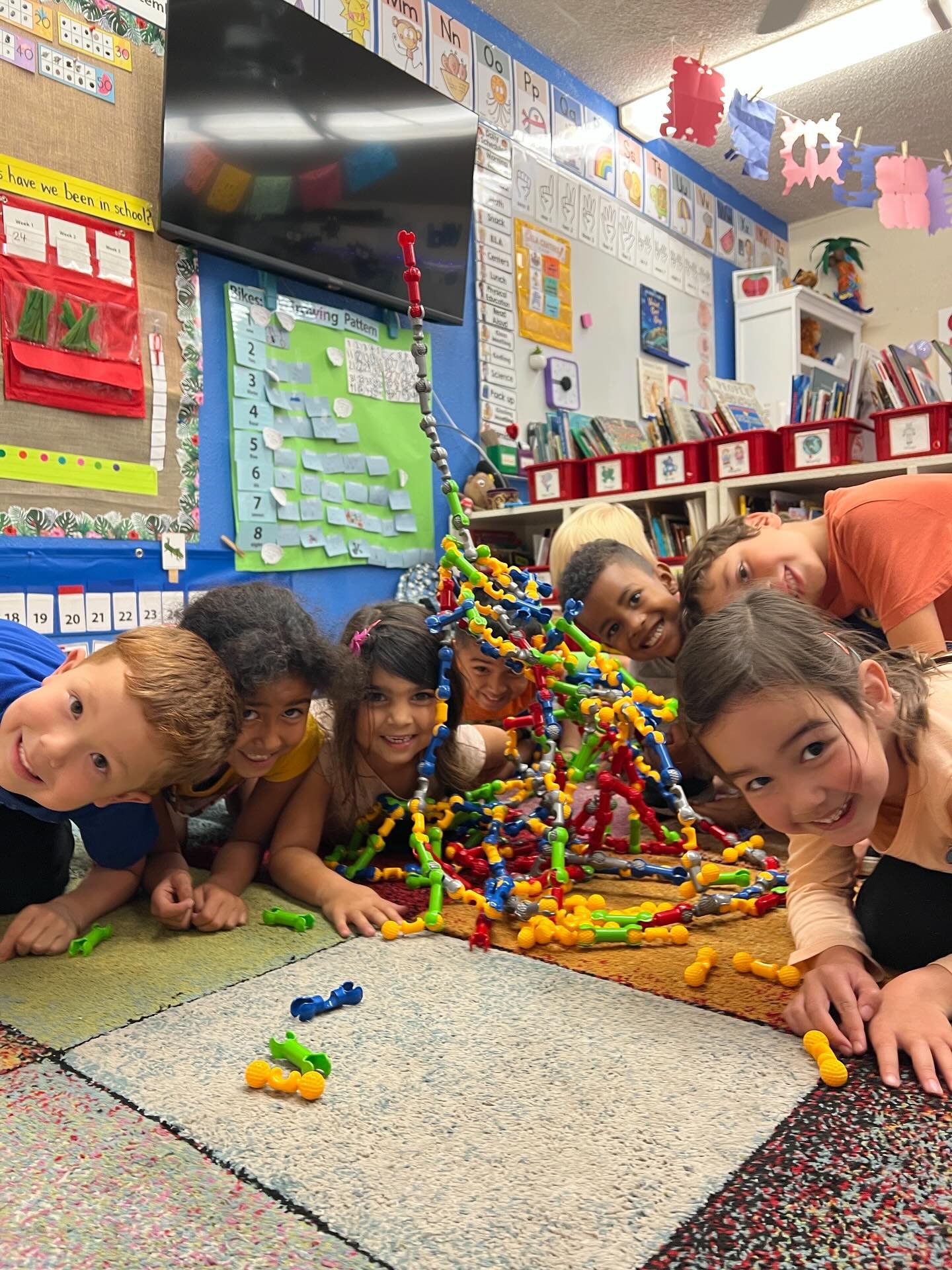 The Kindergarten class worked on building a tower that would be as tall as the cabinets! 🏙️They were given the option of accomplishing this individually, but they all wanted to work together. &ldquo;Let&rsquo;s each make a piece and combine them tog