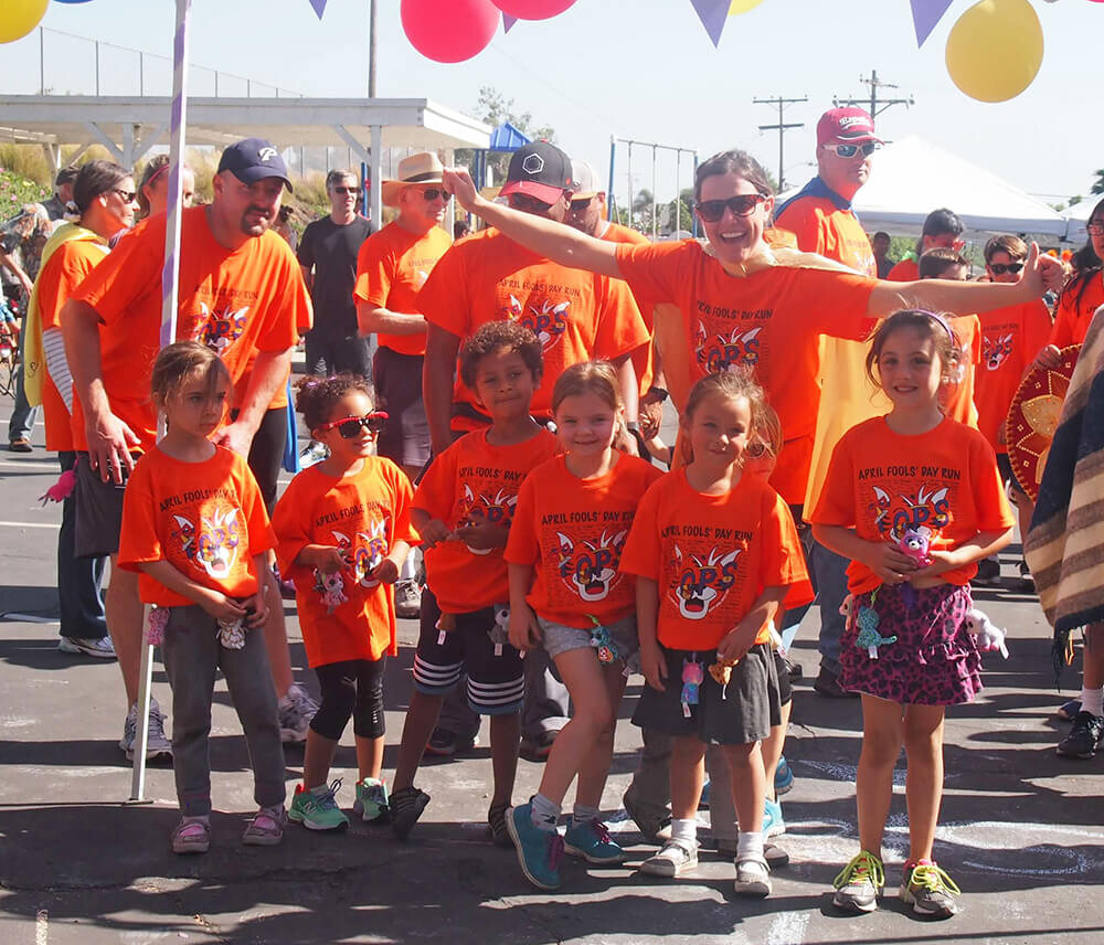 -kindergarten-class-standing-with-teacher-at-jogathon.jpg