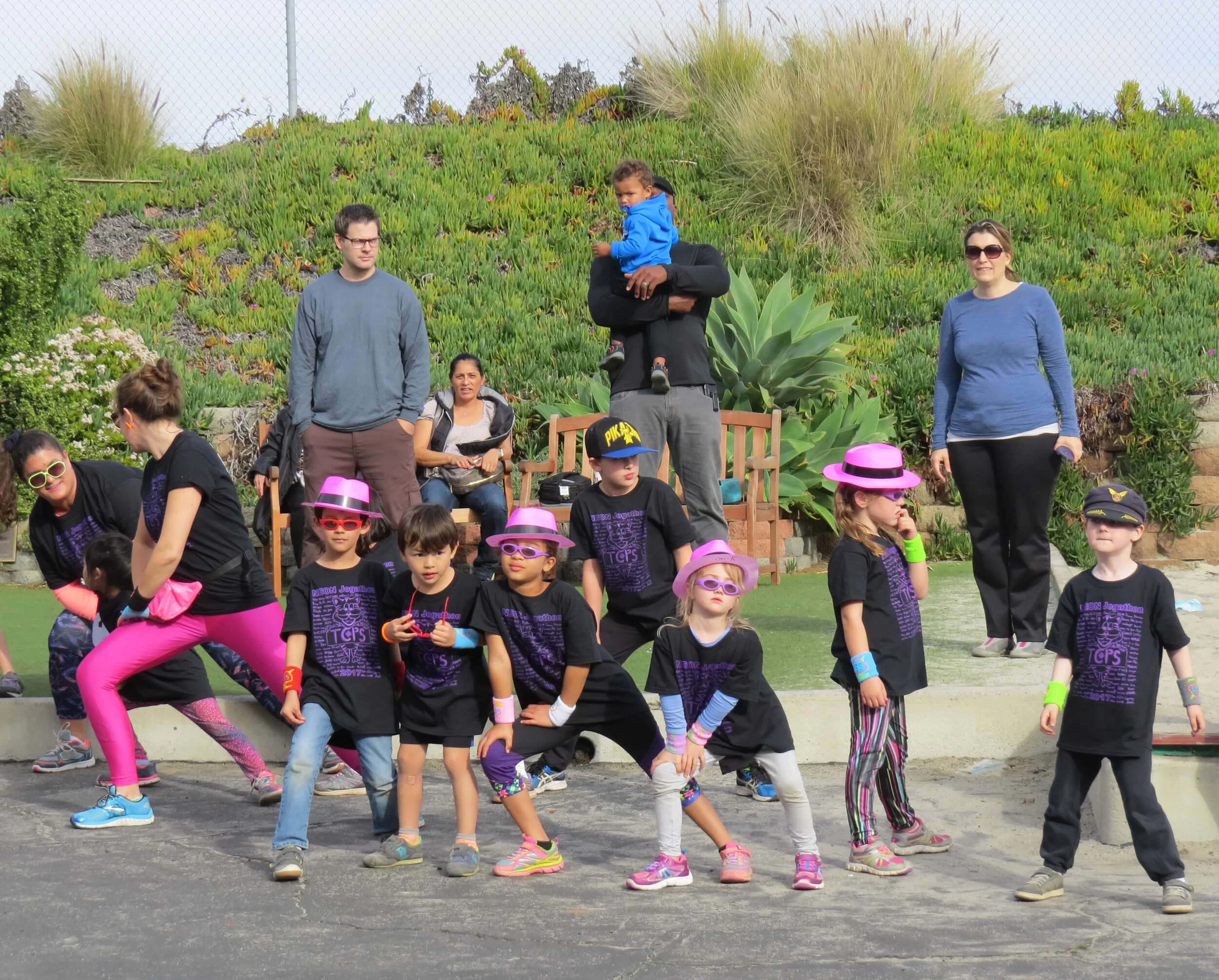 young-��������-students-stretching-before-jogathon.jpg
