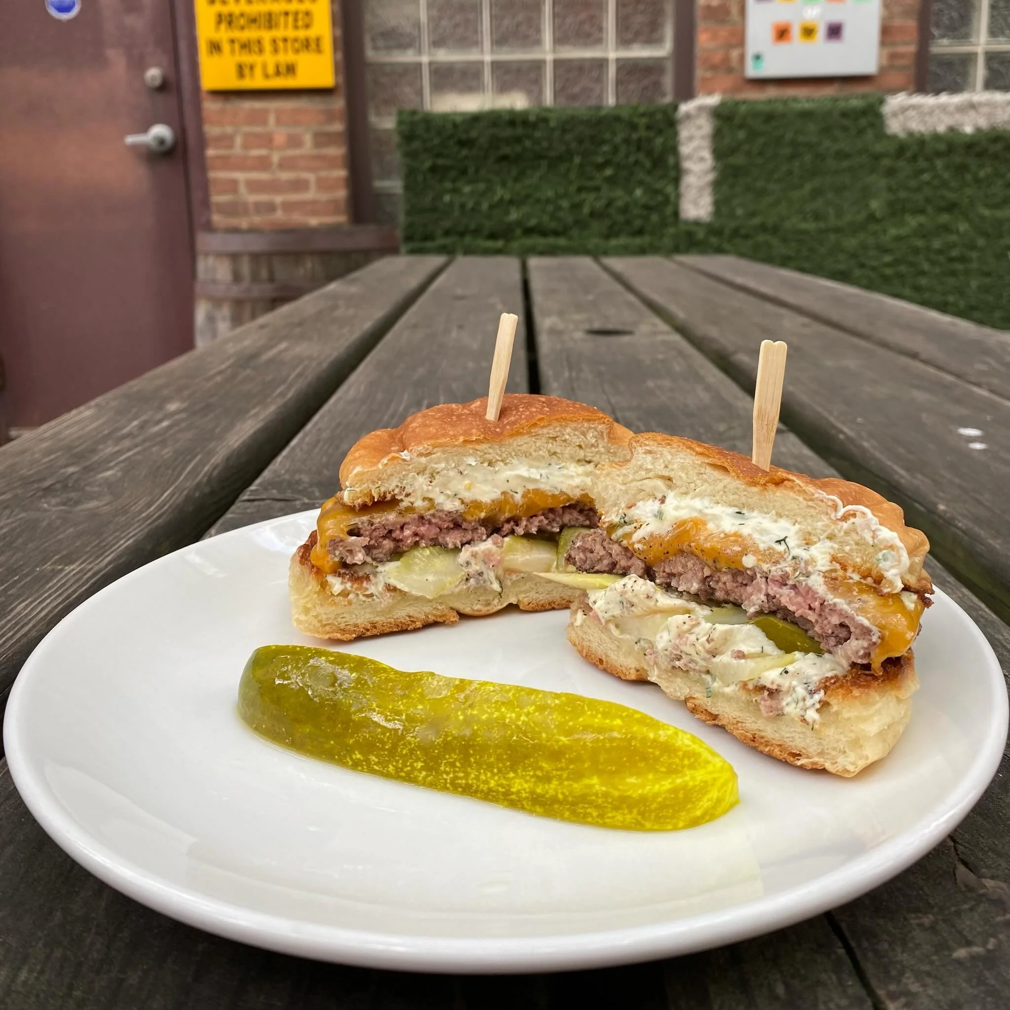 MONDAY BURGER SPECIAL 🍔 Huge props to our kitchen team 👏 They come up with new mouthwatering burger specials each week. Tonight&rsquo;s feature:
DILL BURGER - Pickles, Lemon-Dill Cream Cheese, Cheddar, served w/ chips &amp; pickle - only $9.5! 

Pl