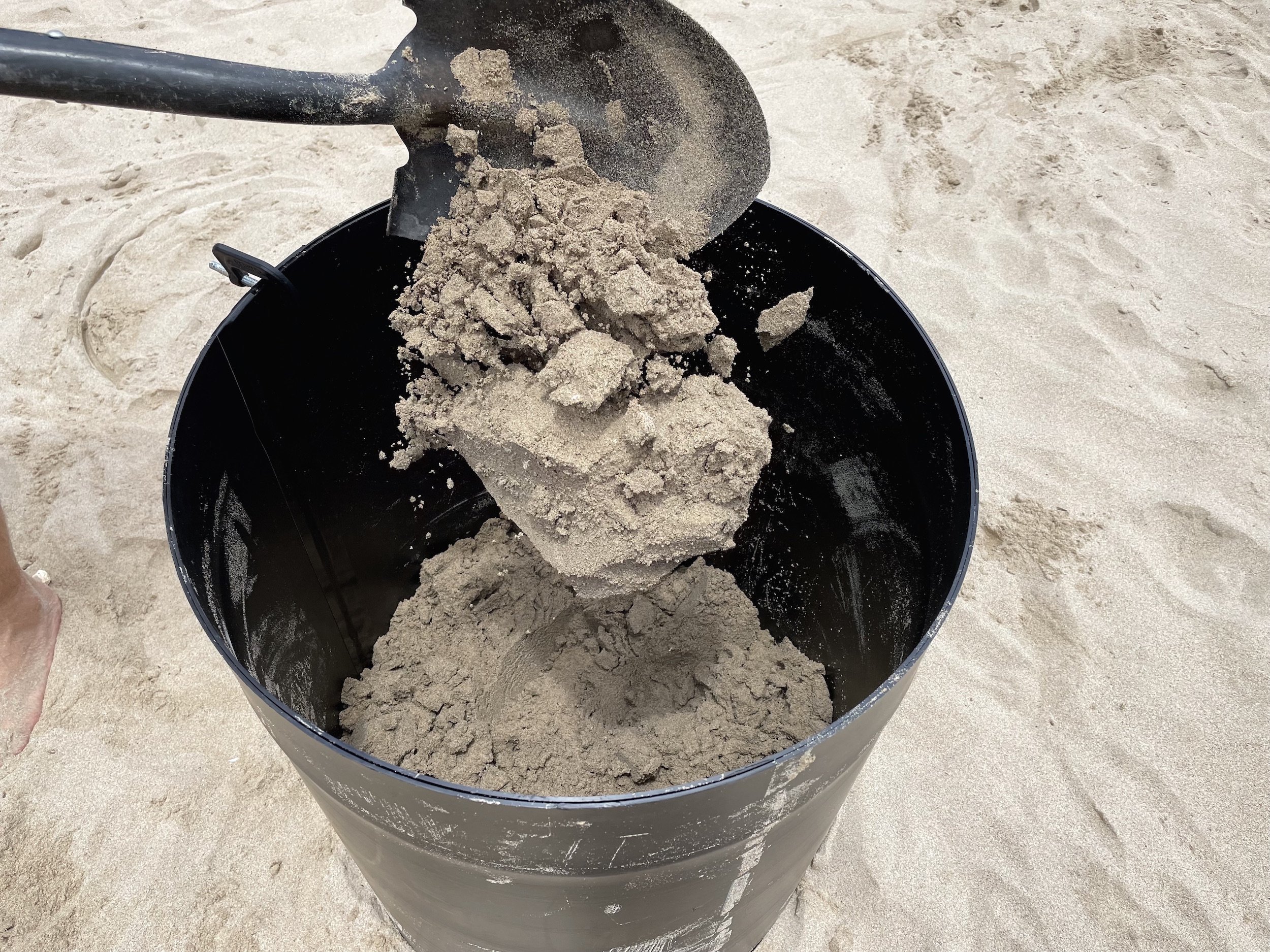 how to compact sand