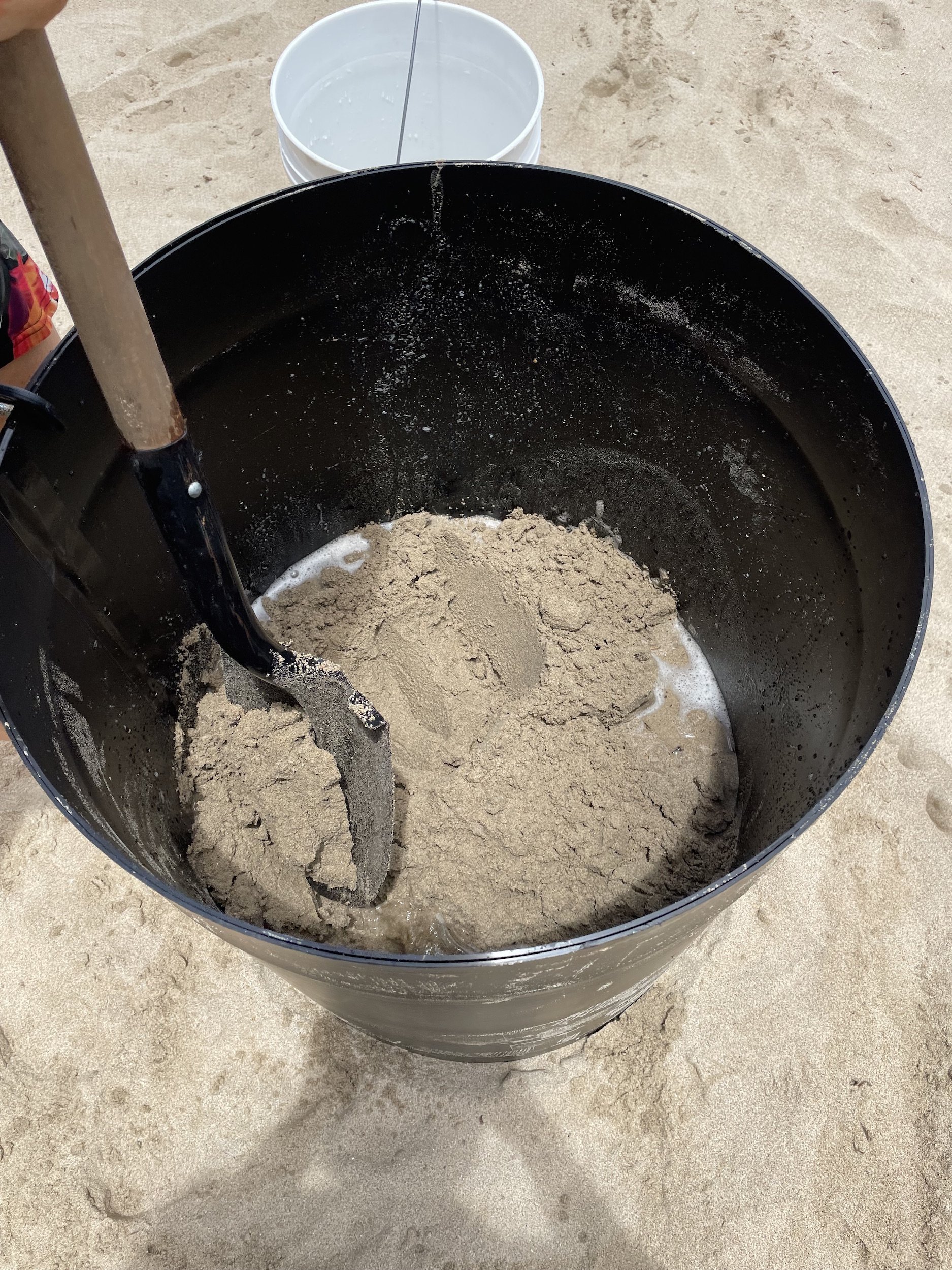 use a plastic form to compact you sand sculptures