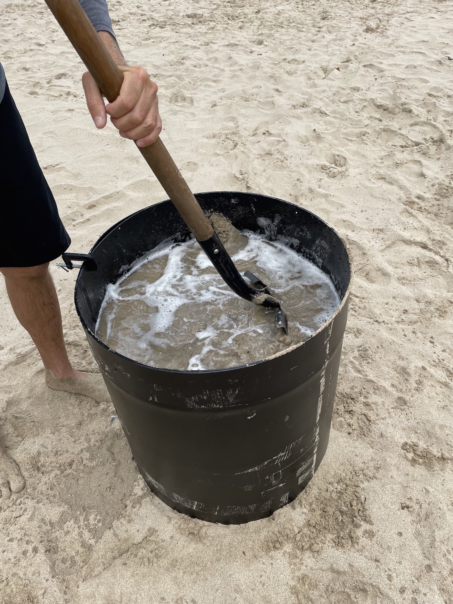 mix your sand in the form using your shovel