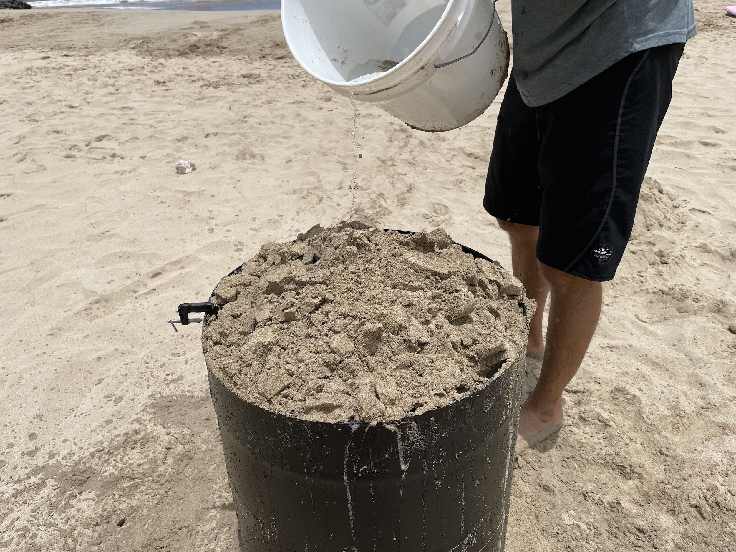 sand castle compaction in a plastic form