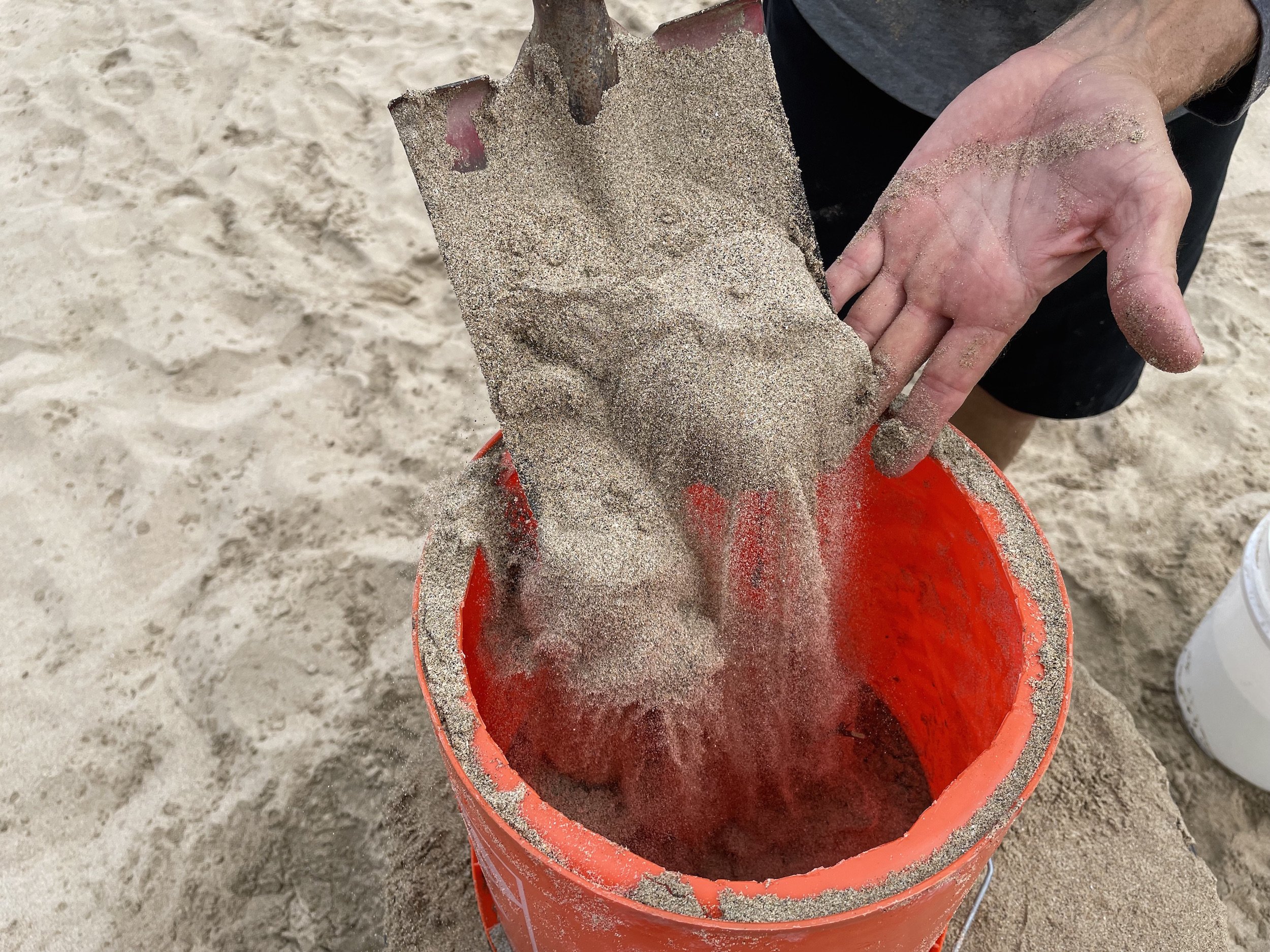 create a high sand sculpture