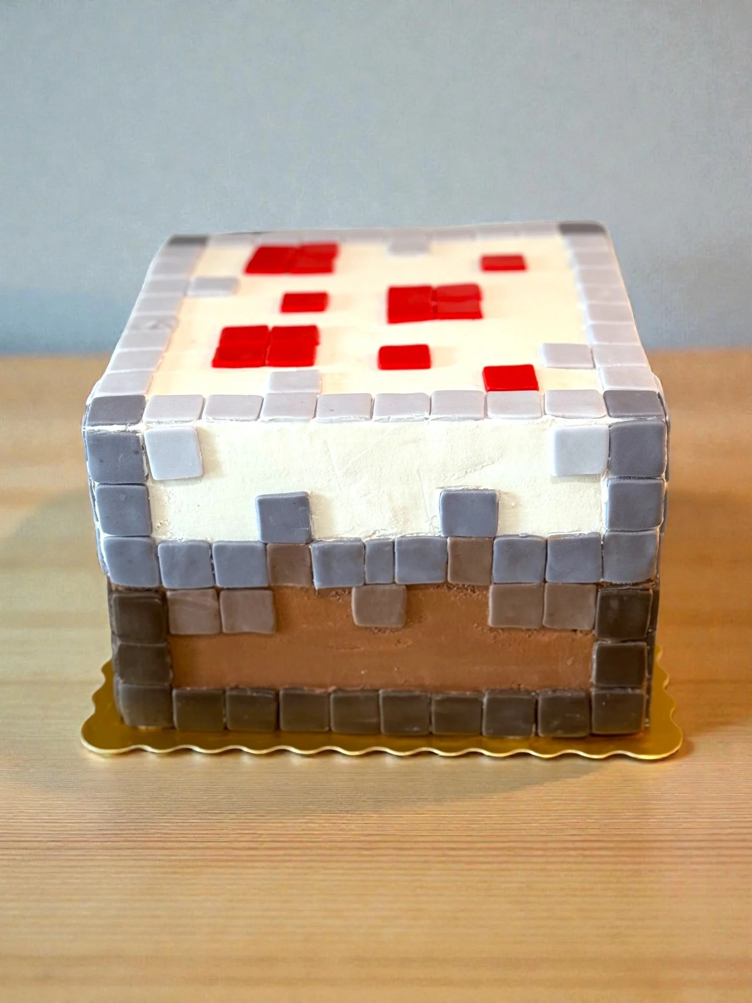 Custom Minecraft dirt block birthday cake with fondant tile detailing