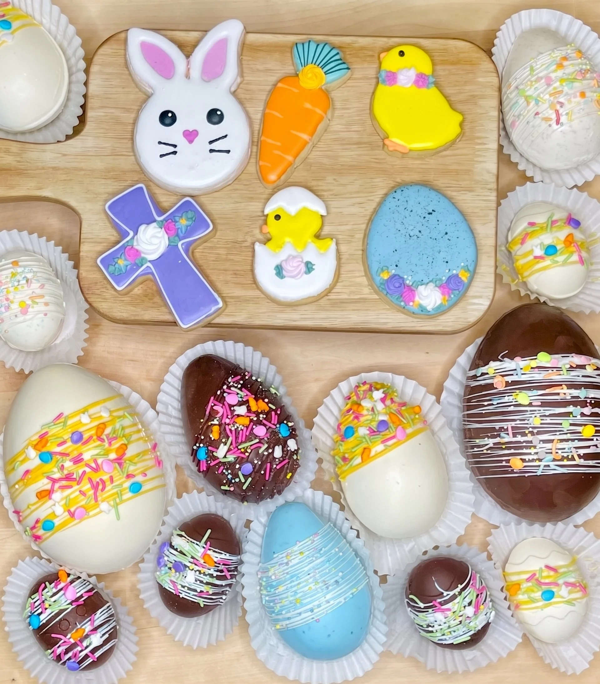 Custom decorated Easter egg cookies with bunny and chick designs