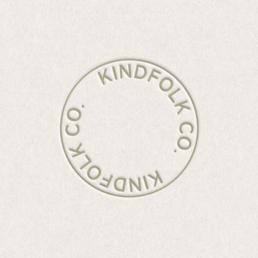 KindFolk circular brand mark