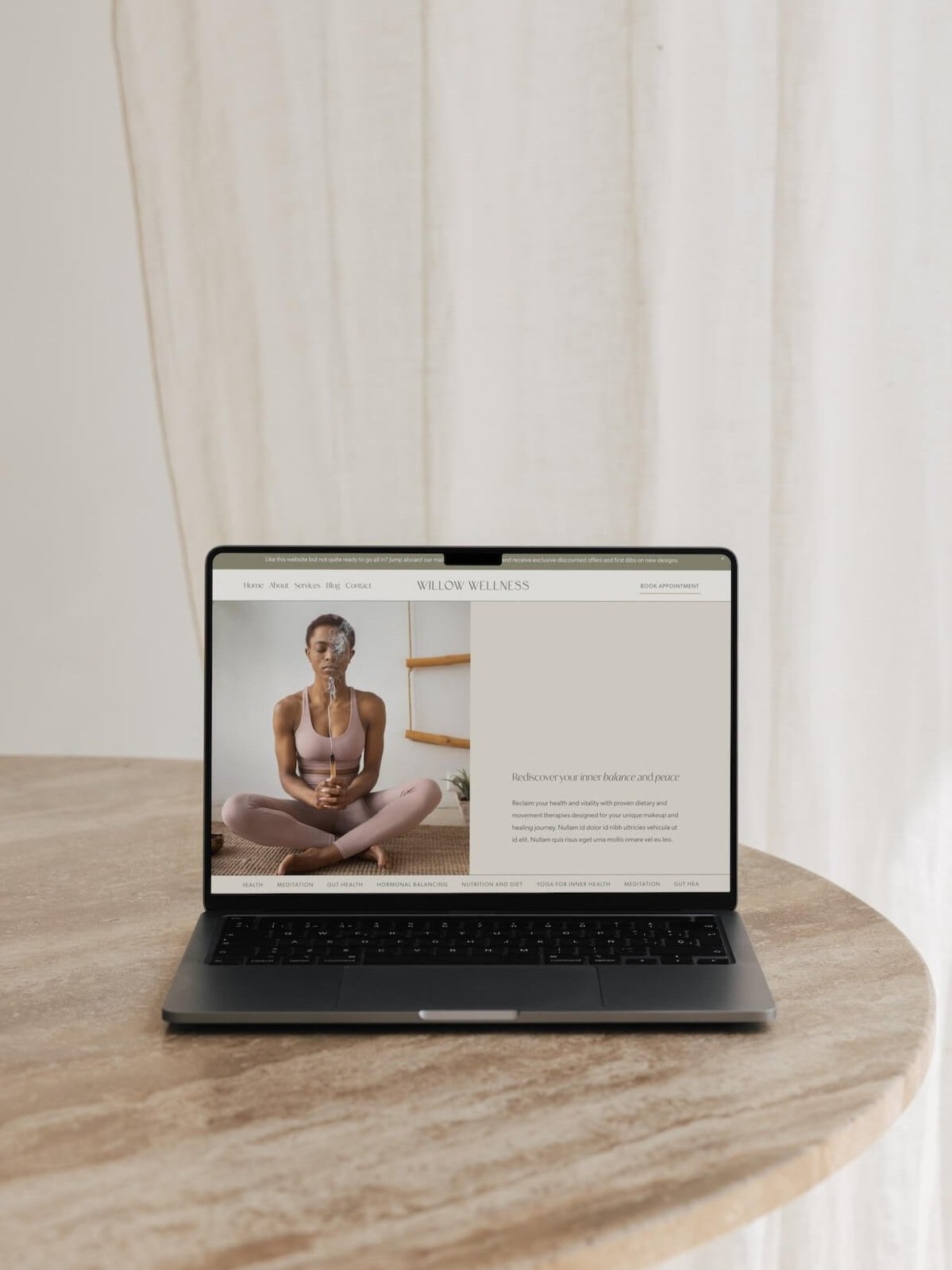 A laptop display the health and wellness Squarespace website design created for holistic practitioners
